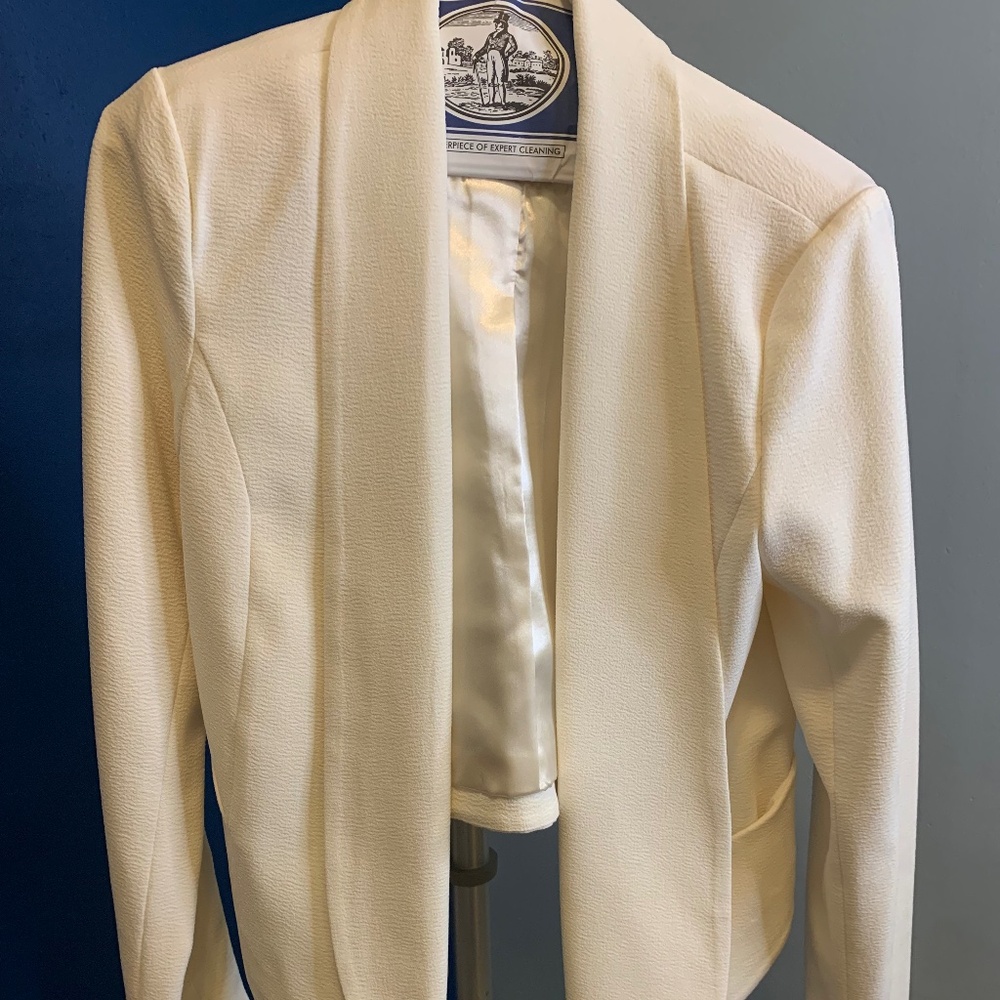 Cream colored cropped tuxedo blazer